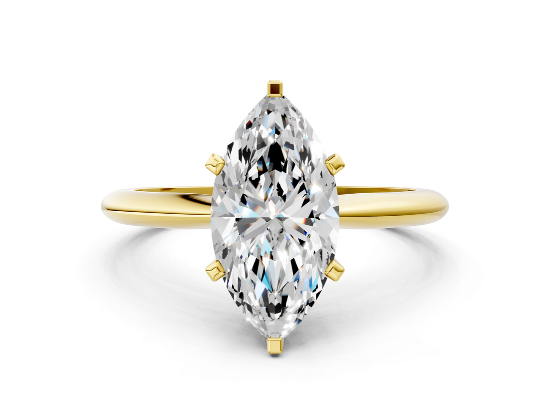Yellow gold Marquise Cut Solitaire Ring with Four-Prong Setting on a Classic Band_70