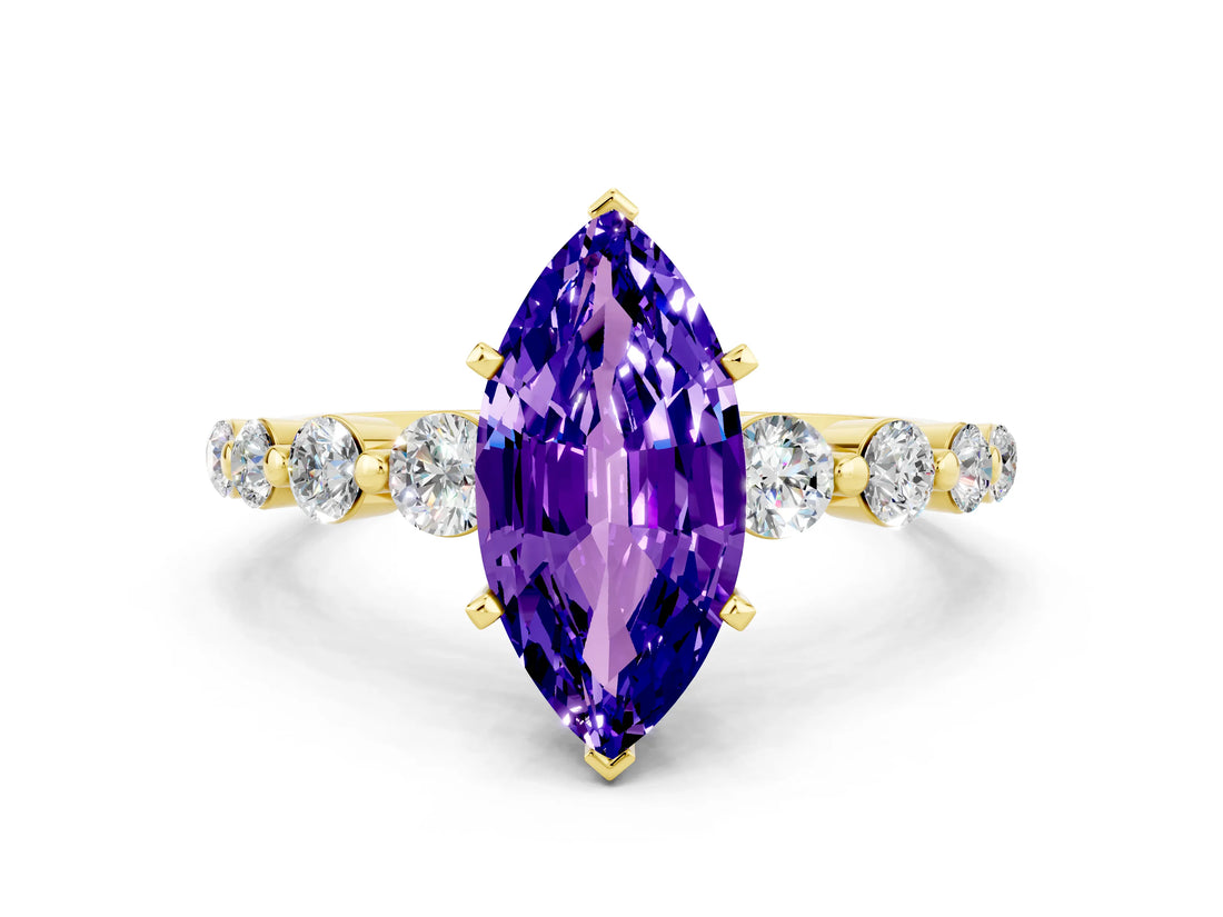 Yellow gold Marquise Cut Solitaire Tanzanite Ring with Pave Band and Four-Prong Setting
