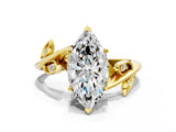 Yellow gold Marquise Cut Solitaire Twist Engagement Ring with Leaf Accents and Prong Setting_3