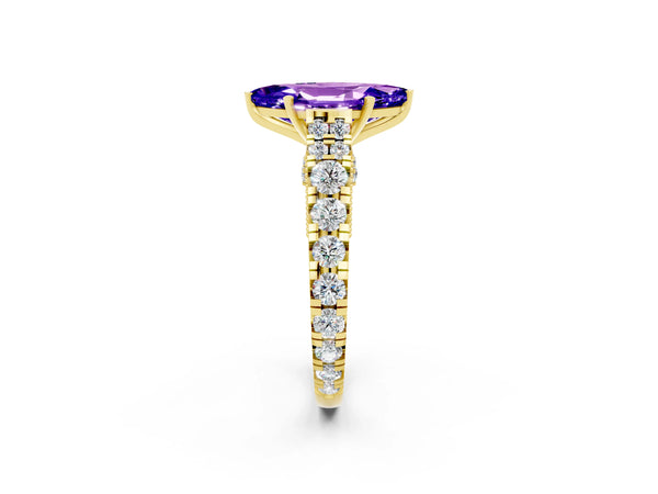 Yellow gold Marquise Cut Tanzanite Classic Solitaire Ring with Pavé Band and Four-Prong Setting