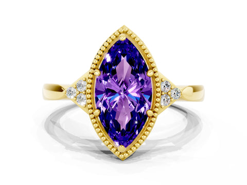 Yellow gold Marquise Cut Tanzanite Halo Ring with Tapered Band and Four-Prong Setting