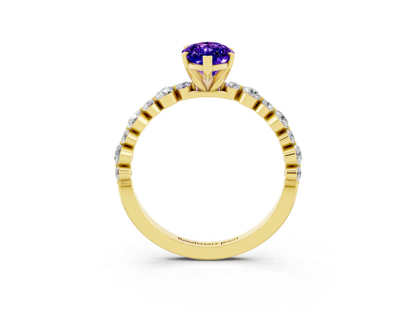 Yellow gold Marquise Cut Tanzanite Prong Set Engagement Ring with Pavé Band