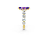Yellow gold Marquise Cut Tanzanite Prong Setting with Side Stones on a Pave Band_2