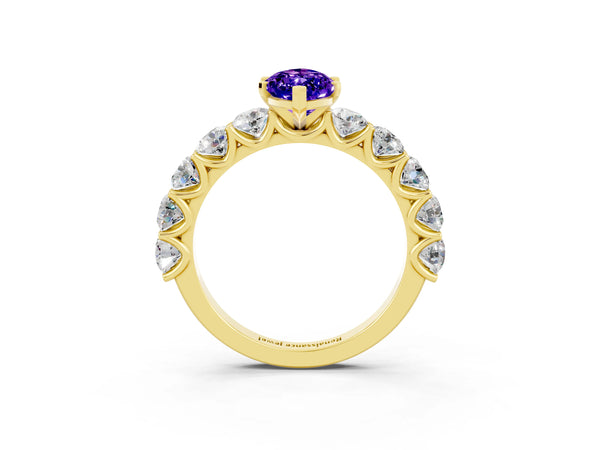 Yellow gold Marquise Cut Tanzanite Prong Setting with Side Stones on a Pave Band