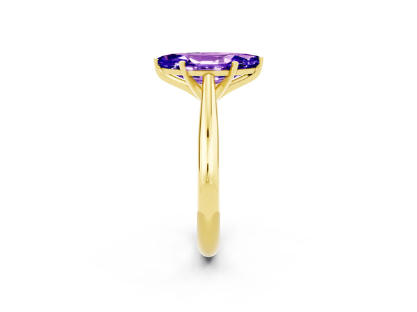 Yellow gold Marquise Cut Tanzanite Solitaire Engagement Ring with Cathedral Setting and Four-Prong Mount