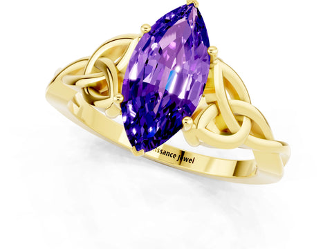 Yellow gold Marquise Cut Tanzanite Solitaire Engagement Ring with Celtic Knot Band and Four-Prong Setting_1