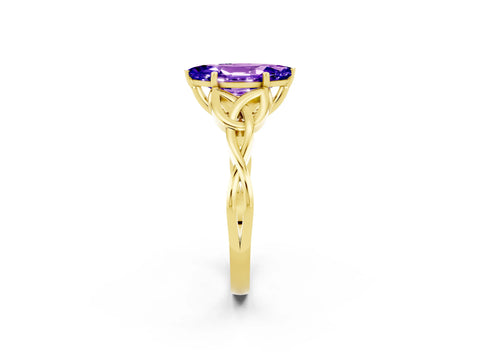 Yellow gold Marquise Cut Tanzanite Solitaire Engagement Ring with Celtic Knot Band and Four-Prong Setting_2