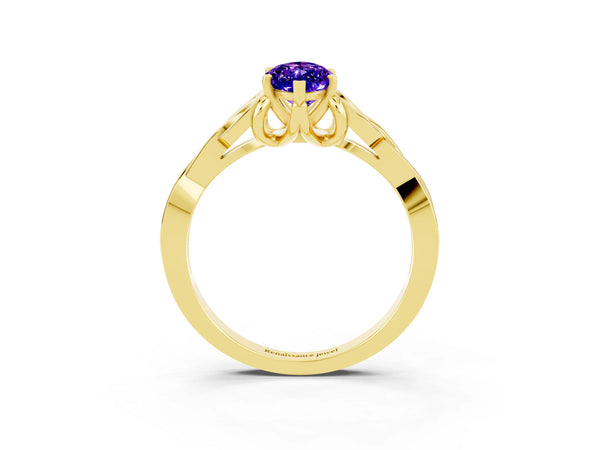 Yellow gold Marquise Cut Tanzanite Solitaire Engagement Ring with Celtic Knot Band and Four-Prong Setting