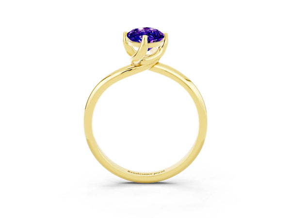 Yellow gold Marquise Cut Tanzanite Solitaire Engagement Ring with Four-Prong Setting and Classic Band