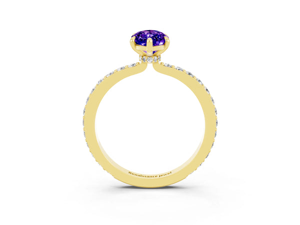 Yellow gold Marquise Cut Tanzanite Solitaire Engagement Ring with Pavé Band and Four-Prong Setting
