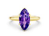 Yellow gold Marquise Cut Tanzanite Solitaire Engagement Ring with Round Band and Four-Prong Setting