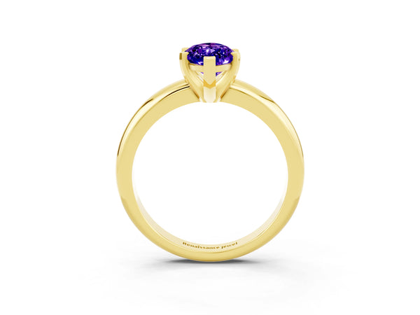 Yellow gold Marquise Cut Tanzanite Solitaire Engagement Ring with Round Band and Four-Prong Setting