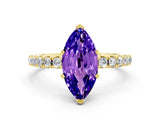 Yellow gold Marquise Cut Tanzanite Solitaire Pavé Band with Four-Prong Setting