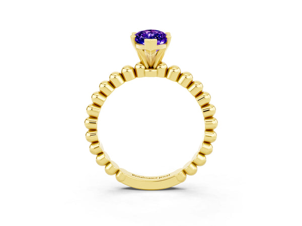 Yellow gold Marquise Cut Tanzanite Solitaire Ring with Beaded Band and Prong Setting