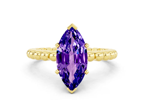 Yellow gold Marquise Cut Tanzanite Solitaire Ring with Beaded Band and Prong Setting