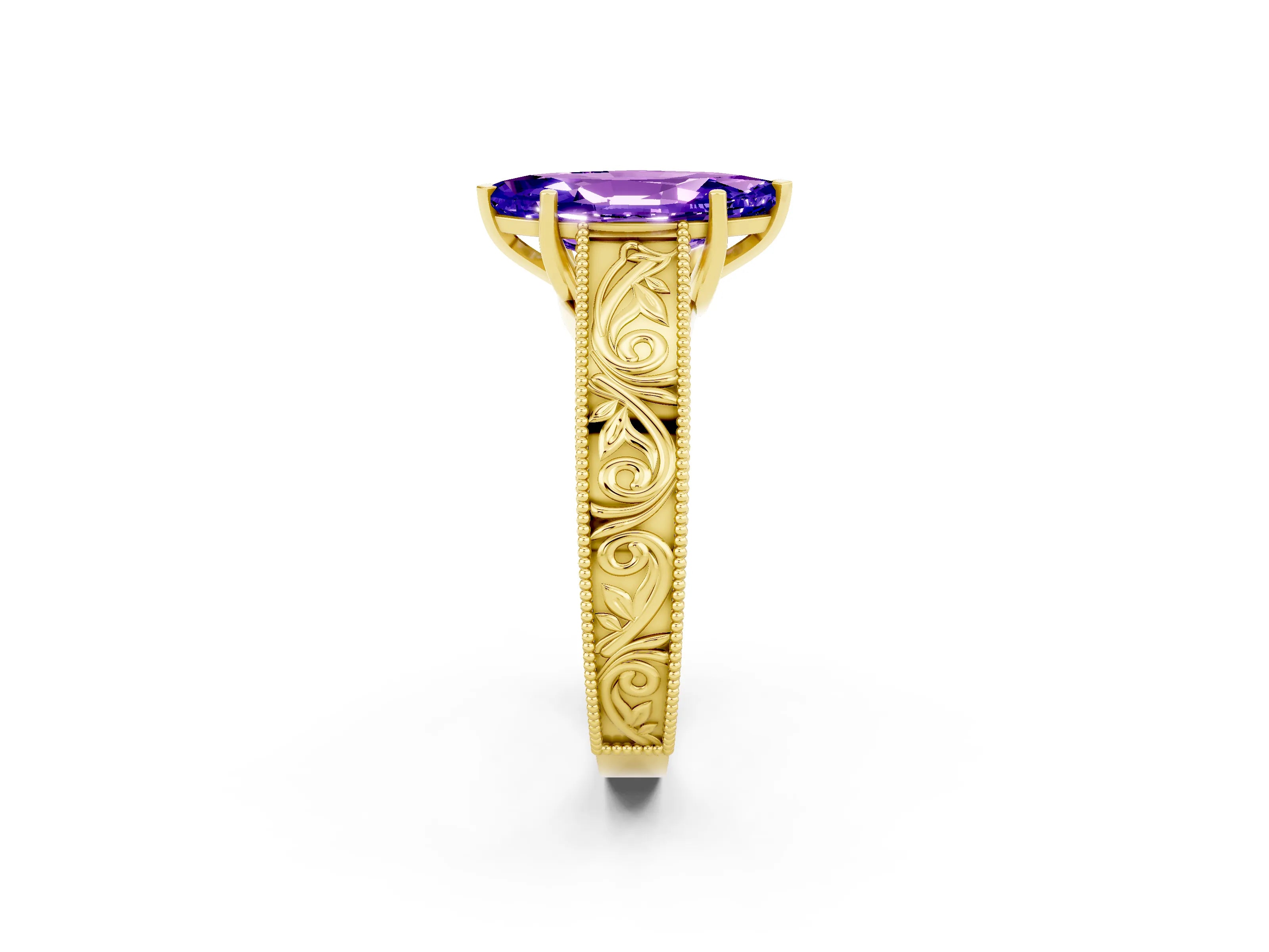 Yellow gold Marquise Cut Tanzanite Solitaire Ring with Engraved Band and Four-Prong Setting_2