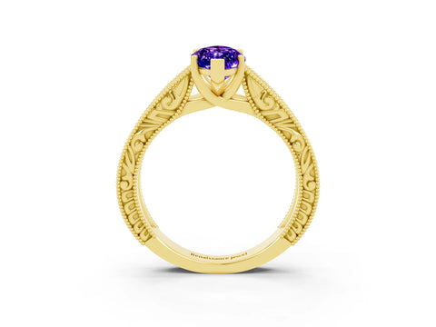 Yellow gold Marquise Cut Tanzanite Solitaire Ring with Engraved Band and Four-Prong Setting_3