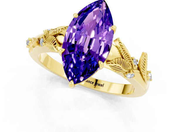Yellow gold Marquise Cut Tanzanite Solitaire Ring with Leaf Motif Band and Four-Prong Setting