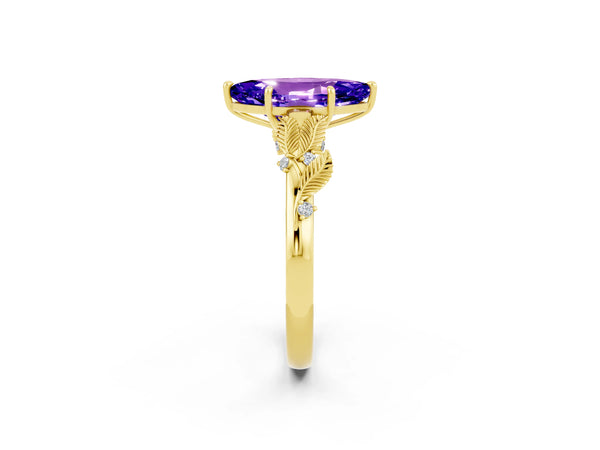 Yellow gold Marquise Cut Tanzanite Solitaire Ring with Leaf Motif Band and Four-Prong Setting