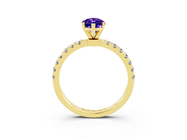 Yellow gold Marquise Cut Tanzanite Solitaire Ring with Pavé Accents and Four-Prong Setting