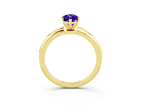 Yellow gold Marquise Cut Tanzanite Solitaire Ring with Six-Prong Setting and Classic Band