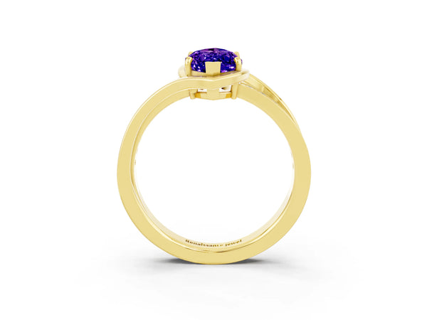 Yellow gold Marquise Cut Tanzanite Solitaire Ring with Split Shank and Prong Setting