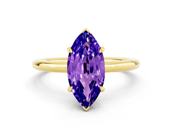 Yellow gold Marquise Cut Tanzanite Solitaire Ring with Thin Band and Four-Prong Setting