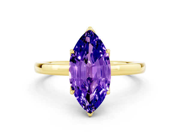 Yellow gold Marquise Cut Tanzanite Solitaire Ring with Thin Band and Prong Setting