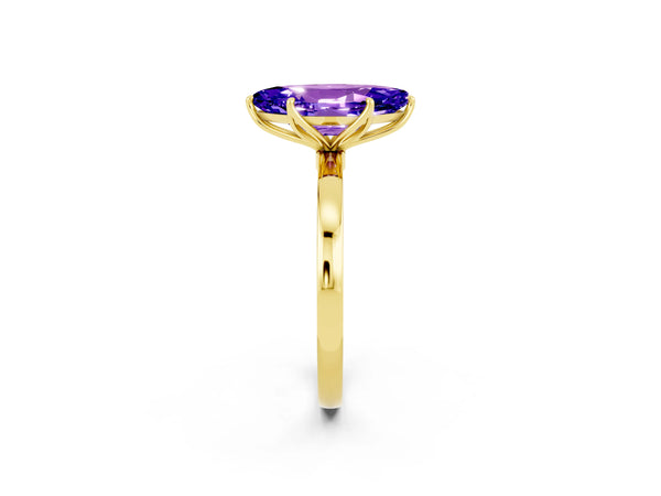 Yellow gold Marquise Cut Tanzanite Solitaire Ring with Thin Band and Prong Setting