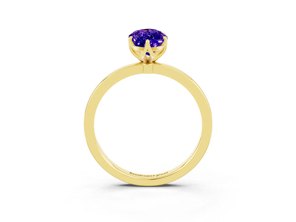 Yellow gold Marquise Cut Tanzanite Solitaire Ring with Thin Band and Prong Setting