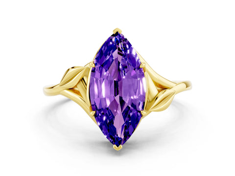 Yellow gold Marquise Cut Tanzanite Solitaire Ring with Twist Band and Four-Prong Setting_24