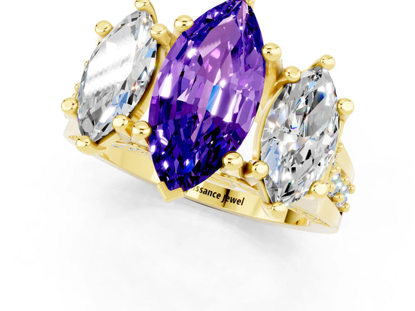 Yellow gold Marquise Cut Tanzanite Three-Stone Ring with Channel Set Band and Four-Prong Setting