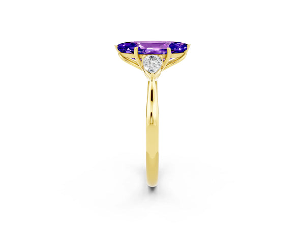 Yellow gold Marquise Cut Tanzanite Three-Stone Ring with Pear  Side Stones and Prong Setting