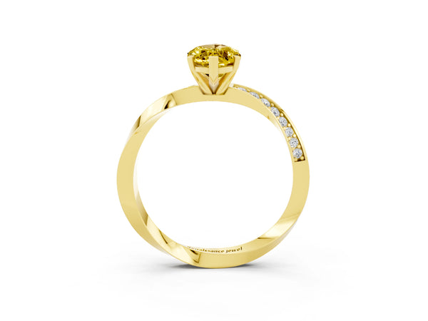Yellow gold Marquise Cut Yellow Sapphire Engagement Ring with Side Stone Accents and Four-Prong Setting