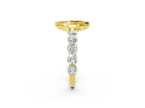 Yellow gold Marquise Cut Yellow Sapphire Prong Setting with Side Stones on a Pave Band