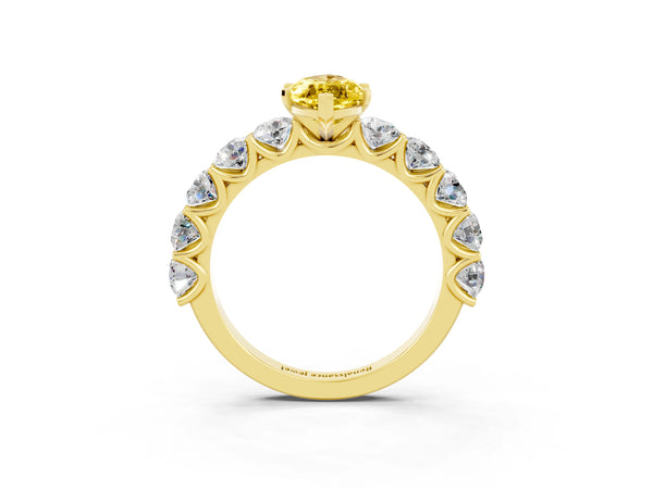 Yellow gold Marquise Cut Yellow Sapphire Prong Setting with Side Stones on a Pave Band