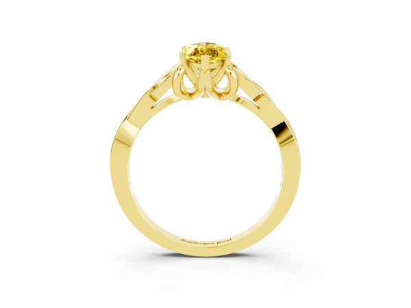 Yellow gold Marquise Cut Yellow Sapphire Solitaire Celtic Knot Ring with Four-Prong Setting