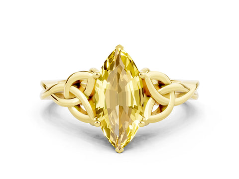 Yellow gold Marquise Cut Yellow Sapphire Solitaire Engagement Ring with Celtic Knot Band and Four-Prong Setting_24