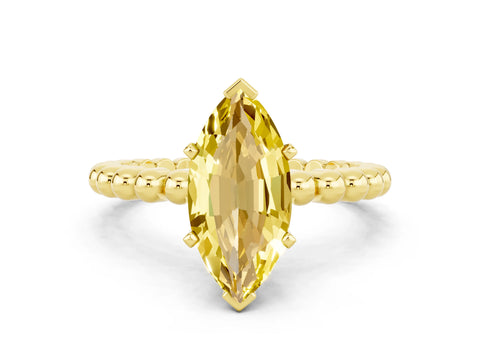 Yellow gold Marquise Cut Yellow Sapphire Solitaire Ring with Beaded Band and Prong Setting