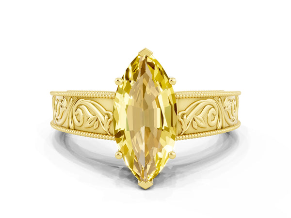 Yellow gold Marquise Cut Yellow Sapphire Solitaire Ring with Engraved Band and Four-Prong Setting