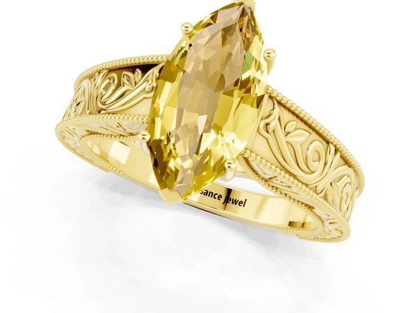 Yellow gold Marquise Cut Yellow Sapphire Solitaire Ring with Engraved Band and Four-Prong Setting