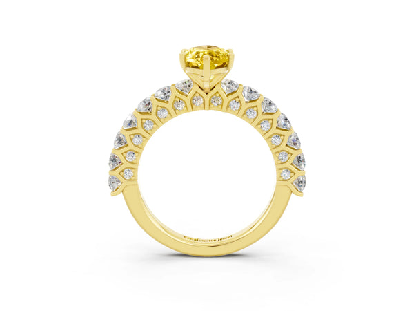 Yellow gold Marquise Cut Yellow Sapphire Solitaire Ring with Shared Prong Pavé Band and Four-Prong Setting