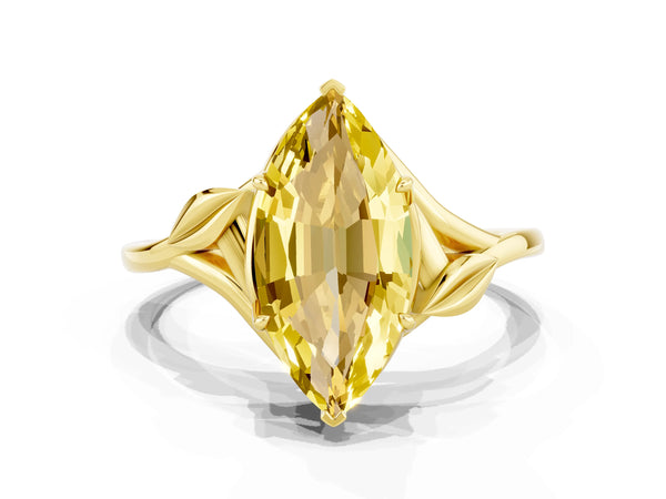 Yellow gold Marquise Cut Yellow Sapphire Solitaire Ring with Twist Band and Four-Prong Setting