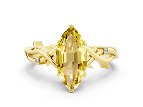 Yellow gold Marquise Cut Yellow Sapphire Solitaire Ring with Twisted Band and Prong Setting