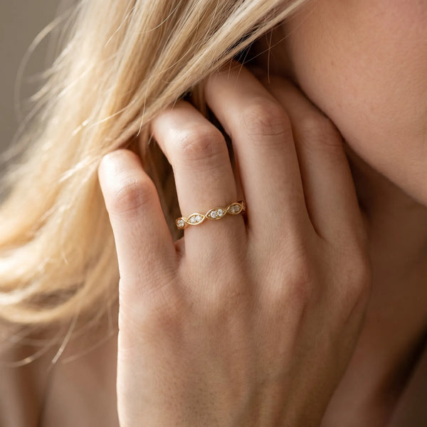Yellow gold Marquise Diamond Eternity Band with Pavé and Bezel Setting