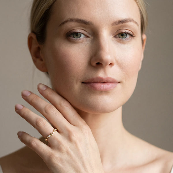 Yellow gold Marquise Diamond Leaf Twist Eternity Band with Bezel Setting