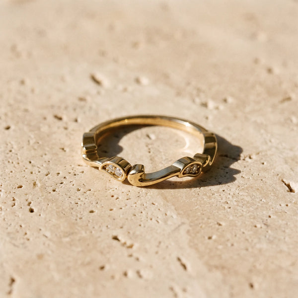 Yellow gold Marquise Diamond Leaf Twist Eternity Band with Bezel Setting