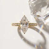 Yellow gold Marquise Diamond Solitaire Ring with Pavé Band and Prong Setting_15