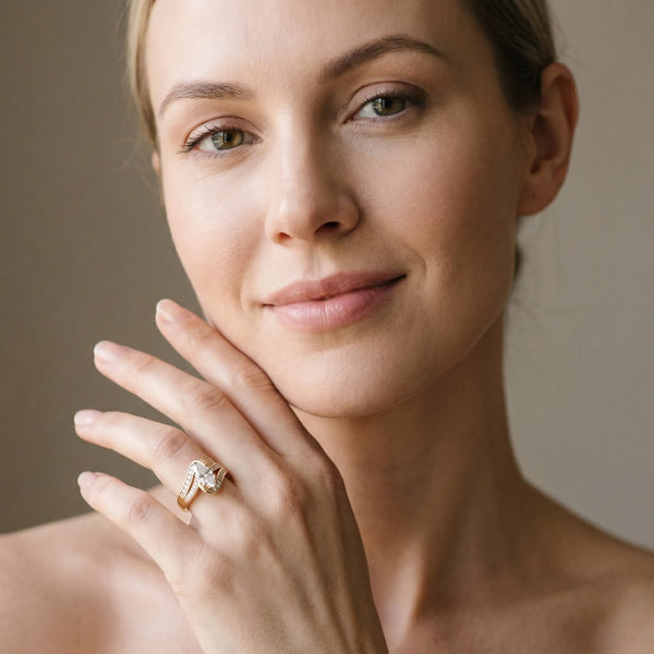 Yellow gold Marquise Solitaire Bypass Diamond Engagement Ring with Channel-Set Band and Four-Prong Setting