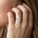 Yellow gold Marquise Solitaire Diamond Engagement Ring with Four-Prong Setting on a Classic Band_15